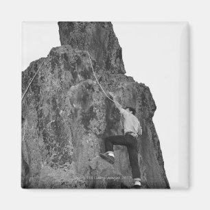 Man Rock Climbing Magnet