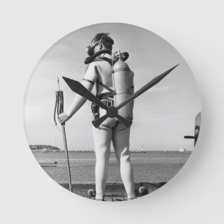 Man Standing on Pier Round Clock