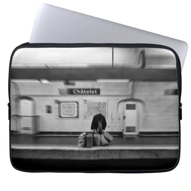 Man with shopping bags in subway (Chatelet) (Front)