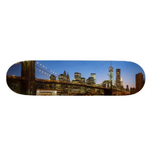Manhattan and Brooklyn Bridge at dusk Skateboard
