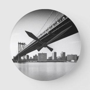 Manhattan Bridge and skyline, New York, US. Round Clock