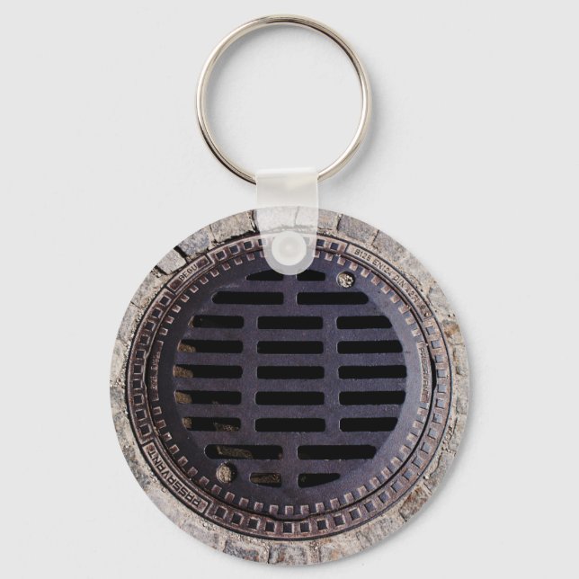 Manhole cover and cobblestone keychain (Front)