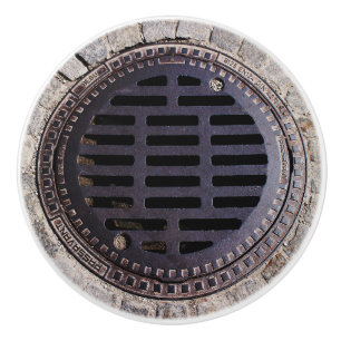 Manhole cover and cobblestone road ceramic knob