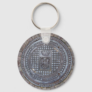Manhole cover and cobblestone road keychain