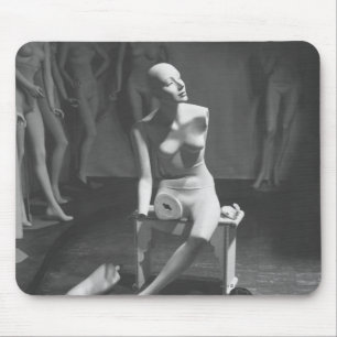 Mannequin with leg and arm removed mouse mat