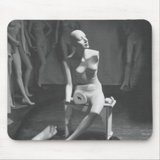 Mannequin with leg and arm removed mouse mat