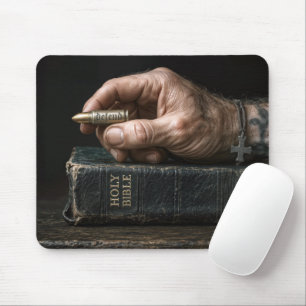 Man's Hand on a Bible Holding a Bullet Mouse Mat
