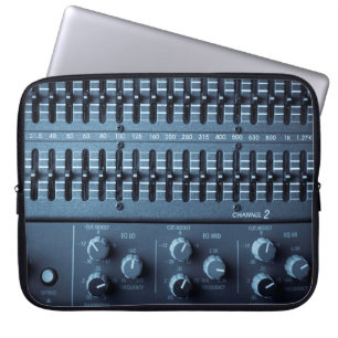 Many buttons on a sound mixer in a recording studi laptop sleeve