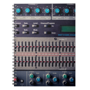 Many buttons on a sound mixer in a recording studi notebook
