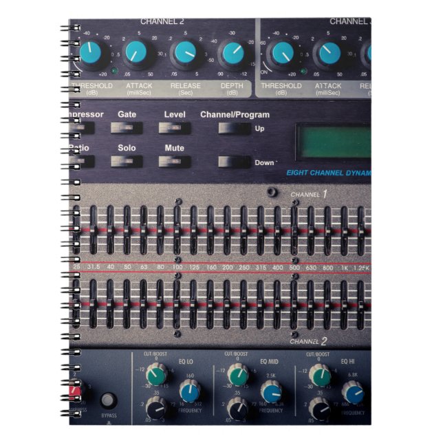 Many buttons on a sound mixer in a recording studi notebook (Front)