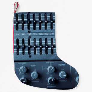 Many buttons on a sound mixer in a recording studi small christmas stocking
