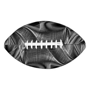 Many twisted with grey grooves on black background american football