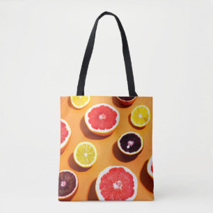 Many variety citrus fruits pattern in sunlight on tote bag