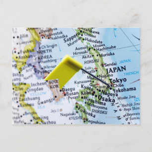 Map pin placed in Tokyo, Japan on map, close-up Postcard