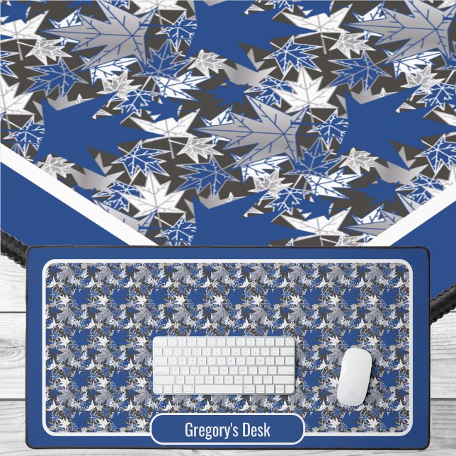 Maple Leaves in blue white and gray Desk Mat (Maple Leaves - Blue white and gray on a charcoal background by The Canadian Outpost)