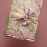 Marble Champaigne Gold Peony Pink Metal Strokes Wrapping Paper<br><div class="desc">Envision wrapping your gifts in a canvas that’s a blend of elegance, artistry, and a whisper of whimsy. The Marble Champagne Gold Peony Pink Metal Strokes Wrapping Paper isn’t just about concealing what's inside; it's a declaration of style, a celebration of beauty in every swirl and stroke. 🎁✨ There's a...</div>
