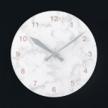 Marble Rose Gold Modern Elegant Round Clock<br><div class="desc">Modern wall clock with rose gold numbers over a grey marble background.   This chic and stylish wall clock makes a great gift for her.</div>