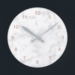 Marble Rose Gold Modern Elegant Round Clock<br><div class="desc">Modern wall clock with rose gold numbers over a grey marble background.   This chic and stylish wall clock makes a great gift for her.</div>