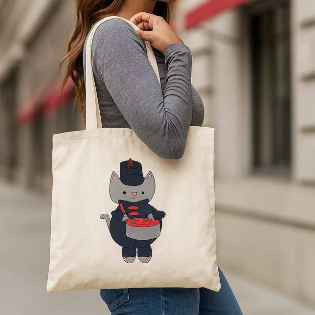 Marching Band Drummer Cat Navy Blue Red Tote Bag (A tote bag featuring a cat playing the drums in a navy blue & red marching band uniform.)
