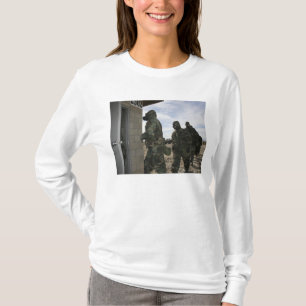 Marines and Sailors file into the gas chamber T-Shirt