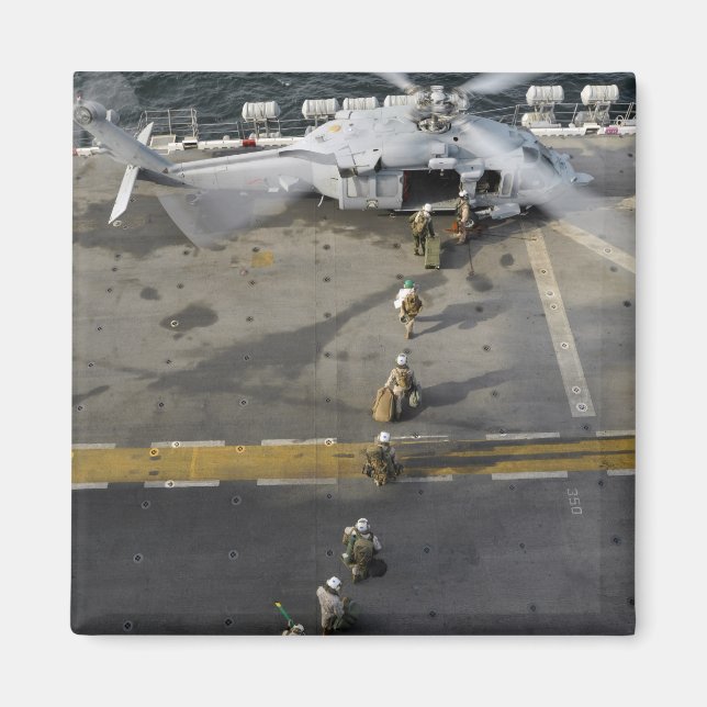 Marines prepare to board an MH-60S Magnet (Front)