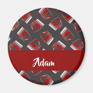 Maroon accordion on grey magnet