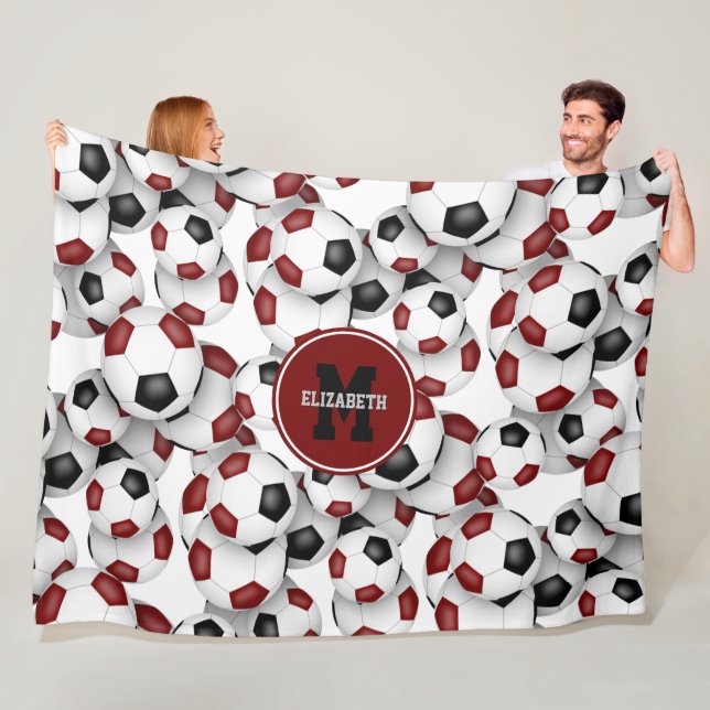 maroon black team colours soccer balls pattern fleece blanket (In Situ)
