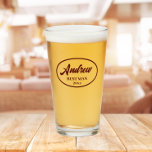 Maroon Stylised Wedding Best Man Name Glass<br><div class="desc">Beer glass for the wedding Best Man that features his name printed in a trendy maroon colour, stylised script inside a maroon colour oval border along with wedding date. A great party supply idea for a bachelor party! Personalise your beer glass by editing and replacing name and date with your...</div>