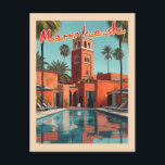 Marrakech Daydream - Mid-Century Travel Postcard<br><div class="desc">A captivating mid-century travel postcard showcasing the vibrant city of Marrakech. The iconic red mud brick buildings and palm trees are bathed in warm sunlight, complemented by a refreshing outdoor pool and loungers. Soft colour hues of orange, pink, green, and blue highlight the scene, while reflections on the water add...</div>