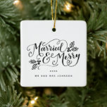 Married and Merry Handlettered Christmas Ceramic Ornament<br><div class="desc">A keepsake for your first Christmas married with this chic and modern holiday ornament that you and loved ones will love year after year. Featuring our original modern hand-lettering that says "Married and Merry" accented by our hand-drawn hollies. Double-sided. Customize with your own text. This design is available in additional...</div>