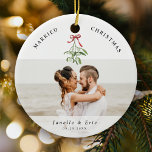 Married Christmas Cute Mistletoe Newlyweds Photo  Ceramic Tree Decoration<br><div class="desc">Cherish your first Christmas together with our 'Married Christmas' ornament. Customised for the newlyweds' joyous memories with 2 favourite wedding photos as well as a cute watercolor mistletoe illustration,  your names and date of nuptials.🎄📸✨ #FirstChristmasJoy #PersonalizedKeepsake</div>