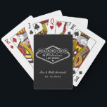 Married in Fabulous Las Vegas Silver Wedding Playing Cards<br><div class="desc">These unique and fun custom "Married in Fabulous Las Vegas" wedding favour playing cards feature a silver faux foil design inspired by the Welcome to Las Vegas,  Nevada" sign,  along with monogram text that can be personalised with the couple's name and wedding date. Black background colour can be modified.</div>