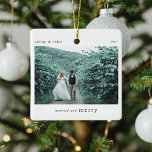 Married & Merry Newlyweds Photo Keepsake Ceramic Ornament<br><div class="desc">A stylish photo holiday christmas tree ornament with classic typography "Married and Merry" in black on a clean simple minimal white background. The photo,  text,  name/s and year can be easily customised to make this ornament unique and personal to you. A simple,  minimalist and contemporary christmas design for newlyweds!</div>