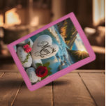 Mary's Heart stone Sunset Trifold Wallet<br><div class="desc">A heart-shaped stone inscribed with the name Mary sits on a riverbank at sunset,  surrounded by roses and smooth pebbles.</div>