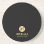 Masculine Black and Gold Personalised Groomsmen Coaster<br><div class="desc">Add a personal touch to your wedding with personalised groomsmen coaster. This coaster features black monogram in gold circle element with name and title in gold professional font style on black background. Also perfect for best man, father of the bride and more. Please Note : The foil details are simulated...</div>