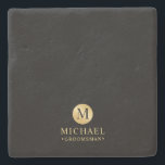 Masculine Black and Gold Personalised Groomsmen Stone Coaster<br><div class="desc">Add a personal touch to your wedding with personalised groomsmen stone coaster. This coaster features black monogram in gold circle element with name and title in gold professional font style on black background. Also perfect for best man, father of the bride, ring bearer and more. Please Note : The foil...</div>