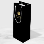 Masculine Black and Gold Personalised Groomsmen Wine Gift Bag<br><div class="desc">Add a personal touch to your wedding with personalised groomsmen gift bag. This gift bag features black monogram in gold circle element with name and title in gold professional font style on black background. Also perfect for best man, father of the bride, ring bearer and more. Please Note : The...</div>