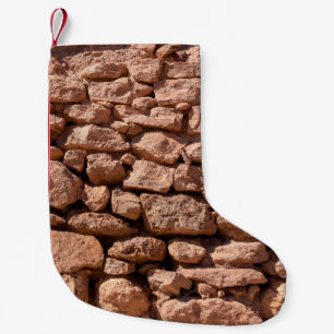 Masonry texture from large rough red stones. Weath Small Christmas Stocking