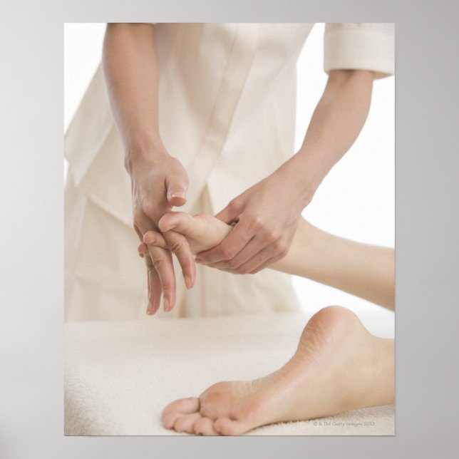 Massage therapist applying foot massage 2 poster (Front)