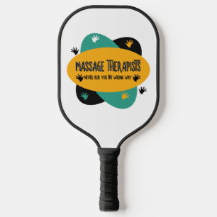 Massage Therapists Hands Rub Colourful Pickleball Paddle