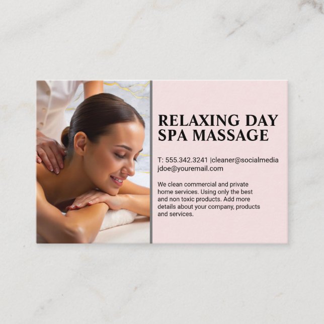 Masseuse giving back massage to woman on spa table business card (Front)