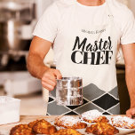 Master Chef name personalised black white chequere Apron<br><div class="desc">Geometric mosaic pavement style patterned print all over elegant apron in black, white and dark grey charcoal with a masculine look and bold MASTER CHEF typography script. You can personalise it with your name. It can be a nice gift for a cooking lover or a master chef - husband, friend,...</div>