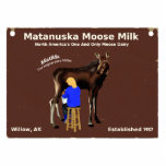 Matanuska Moose Milk Sign Photo Sculpture Magnet<br><div class="desc">An old, wooden sign from the world famous and entirely mythical Matanuska Moose Milk dairy farm in Willow Alaska; not too far from Anchorage. The image features a milkmaid hand milking Matilda, the farm's first dairy moose. Believe it or not there are moose dairies; a small number in Russia and...</div>