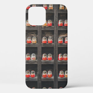 Matryoshka doll lot on shelf iPhone 12 case