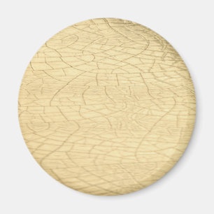 Matted gold stone magnet