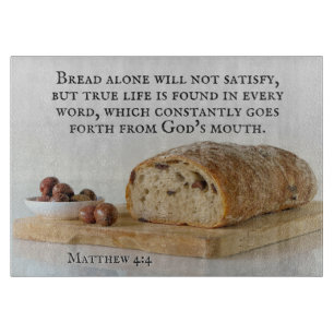Matthew 4:4 Man shall not live on bread alone Cutting Board
