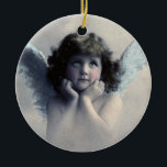 May the angels watch over you ceramic tree decoration<br><div class="desc">A comforting blessing on the back reads: may the angels watch over you. Beautiful vintage design of a sweet angel with soft white wings and rosy cheeks,  holding her face in her hands. Looking peaceful and kind. The background is filled with soft ethereal clouds.</div>