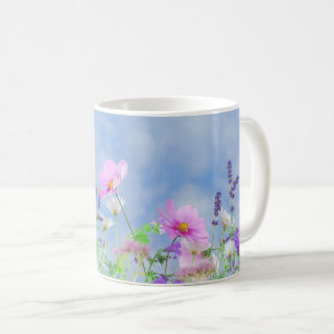 Meadow with beautiful pastel wildflowers coffee mug