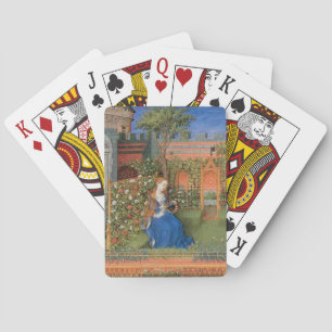 Mediaeval lady in rose garden playing cards