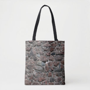Mediaeval stone wall texture backgroundabstract, a tote bag